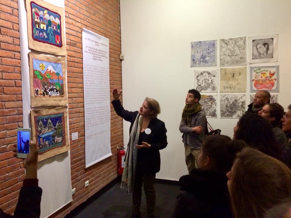 Curator Christine Bouilloc from Bargoin Museum, France explains ARPILLERAS in the context of Rebeldes / Rebels. (Photo: Thibault Jamois)