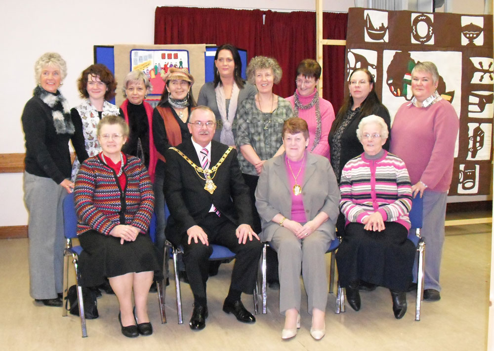 Organisers, textile artists, curator and elected representative pictured at the exhibition launch. (Photo: Martin Melaugh)