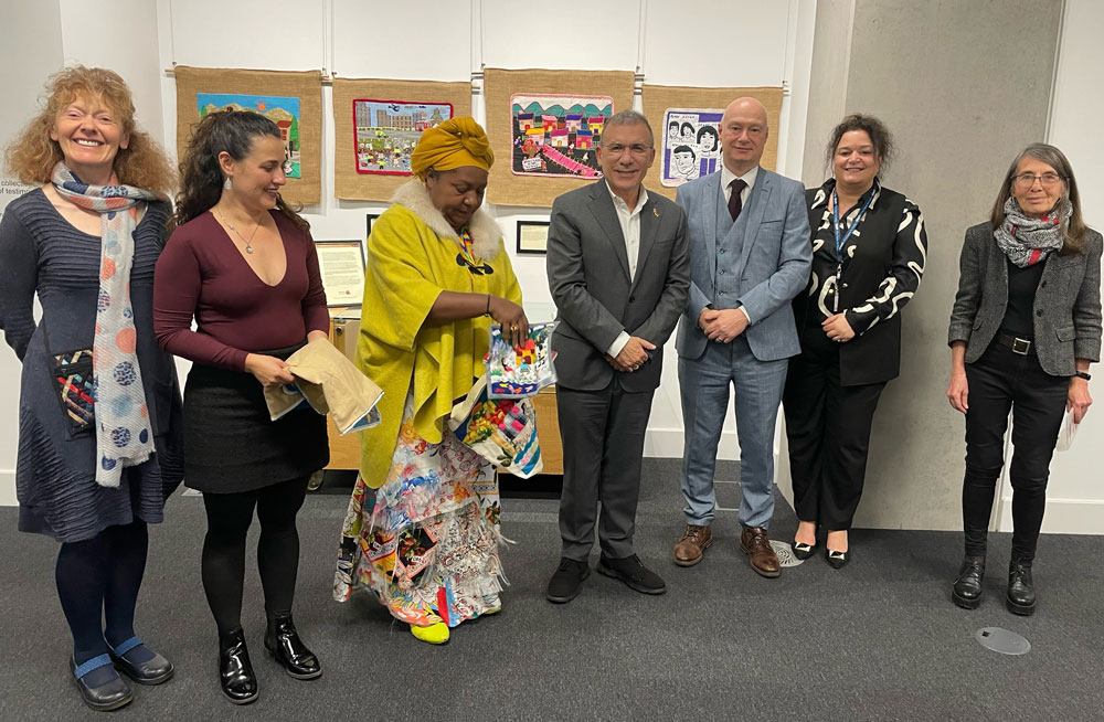 (L-R): Breege Doherty; Juliana & Juana, Museo de Arte y Memoria de Mampujan; UK Colombian Ambassador HE Roy Barreras;   Vice-Chancellor, UU, Paul Bartholomew; Jeanie Parris, Belfast Campus Library, UU; Roberta Bacic, Conflict Textiles. (Photo: GR)
